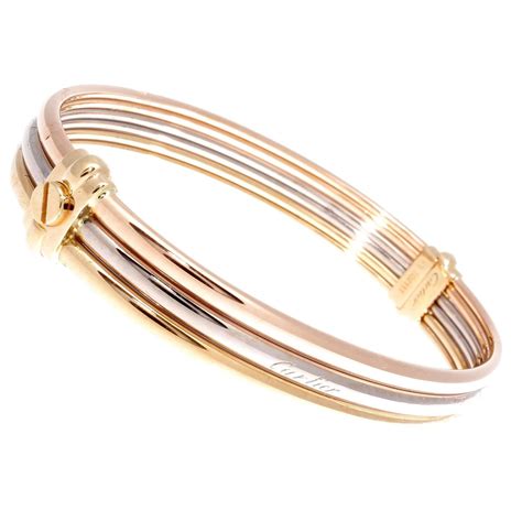 gold cartier bracelet|cartier gold bracelet with screws.